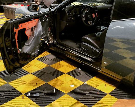 Swisstrax floor tiles used in an auto body shop