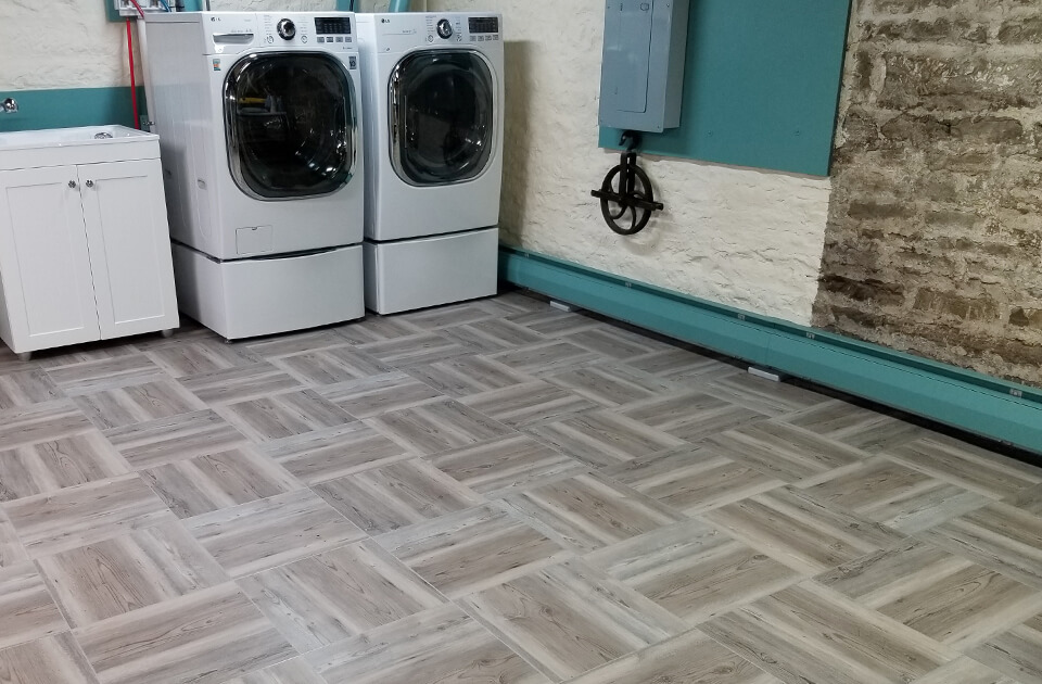 Laundry room with Swisstrax floor tiles installed