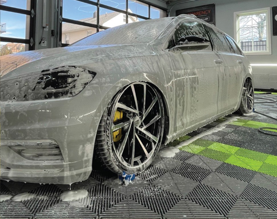 Auto detail shop with Ribtrax Pro tiles installed in the garage