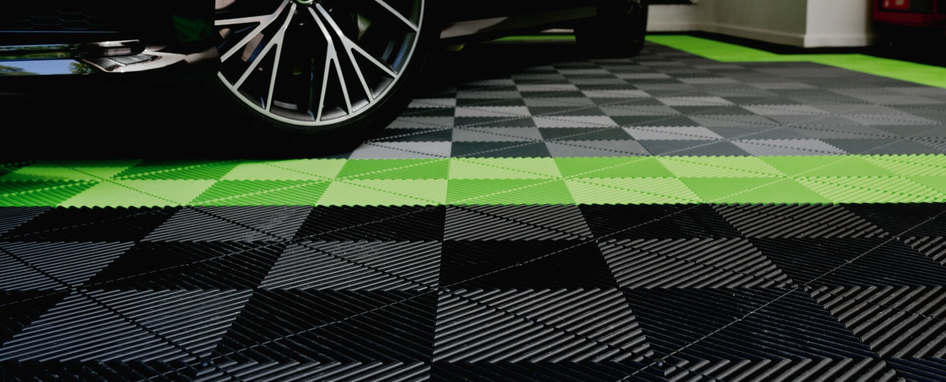 Garage Floor with Green, Black and Gray Tiles