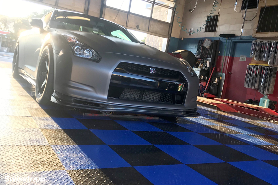 Auto shop garage installed with Diamondtrax tiles installed