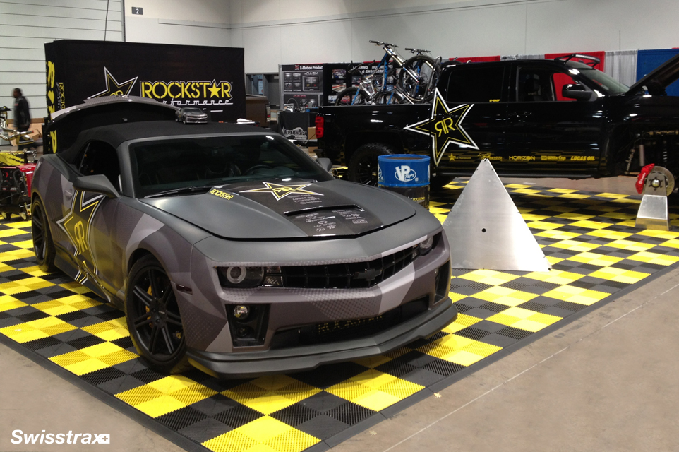 Yellow and black Ribtrax Pro tiles installed in Rockstar Performance Garage