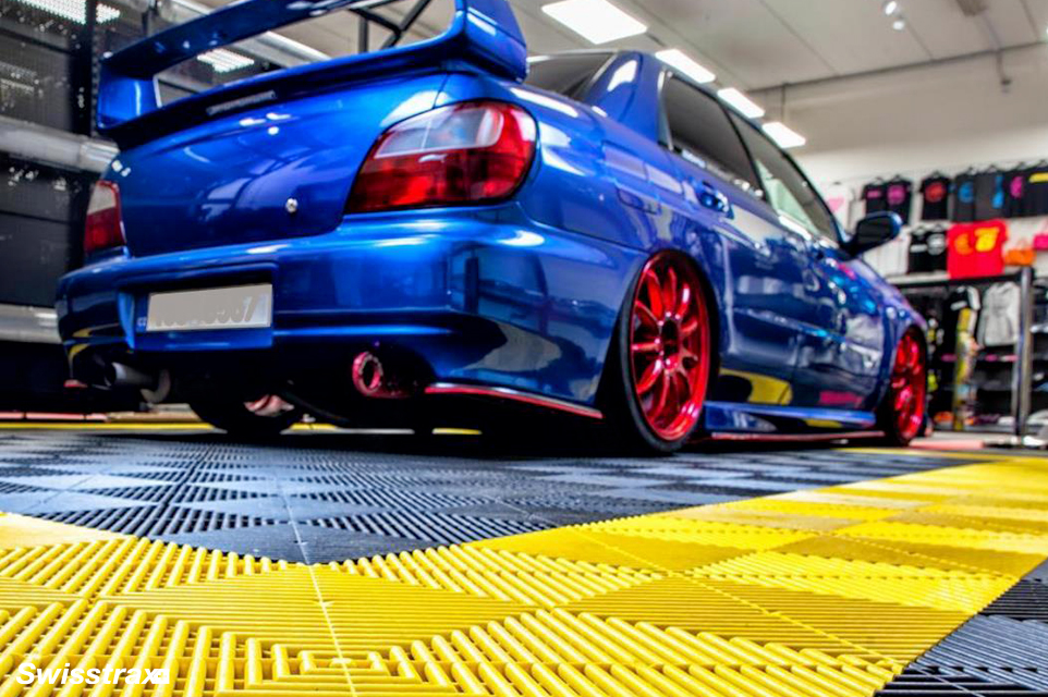 Ribtrax Pro tiles installed in a auto tuning garage