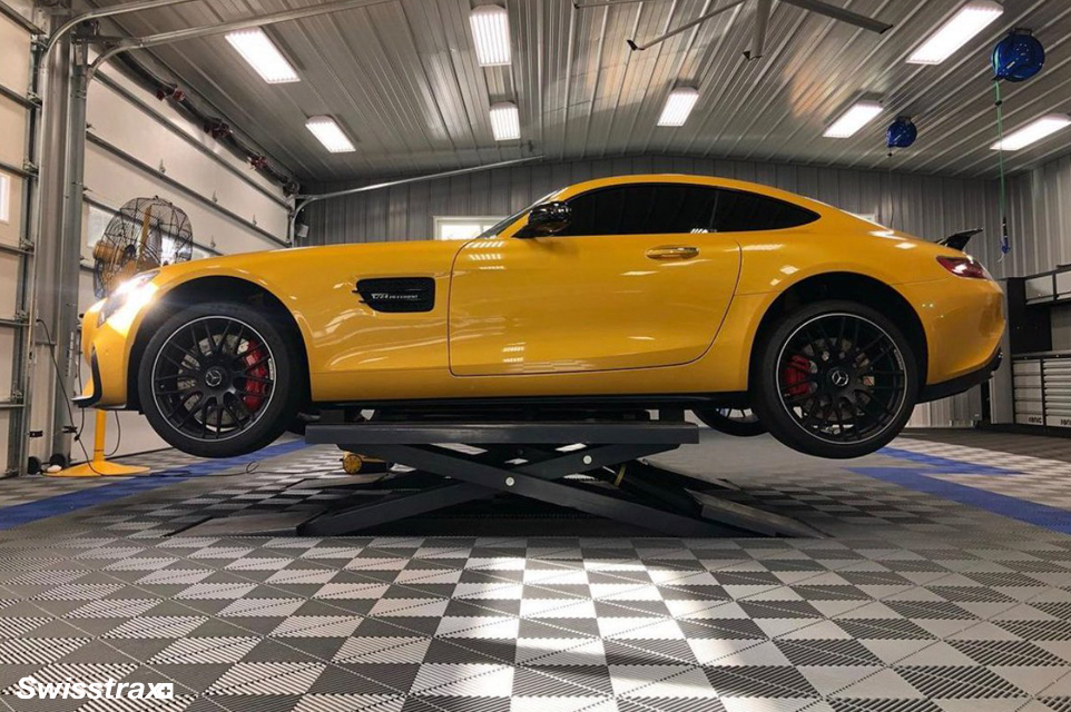 Mechanic garage installed with garage floor tiles from Swisstrax