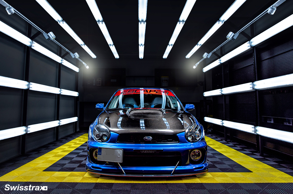 Car photo booth installed with garage flooring from Swisstrax