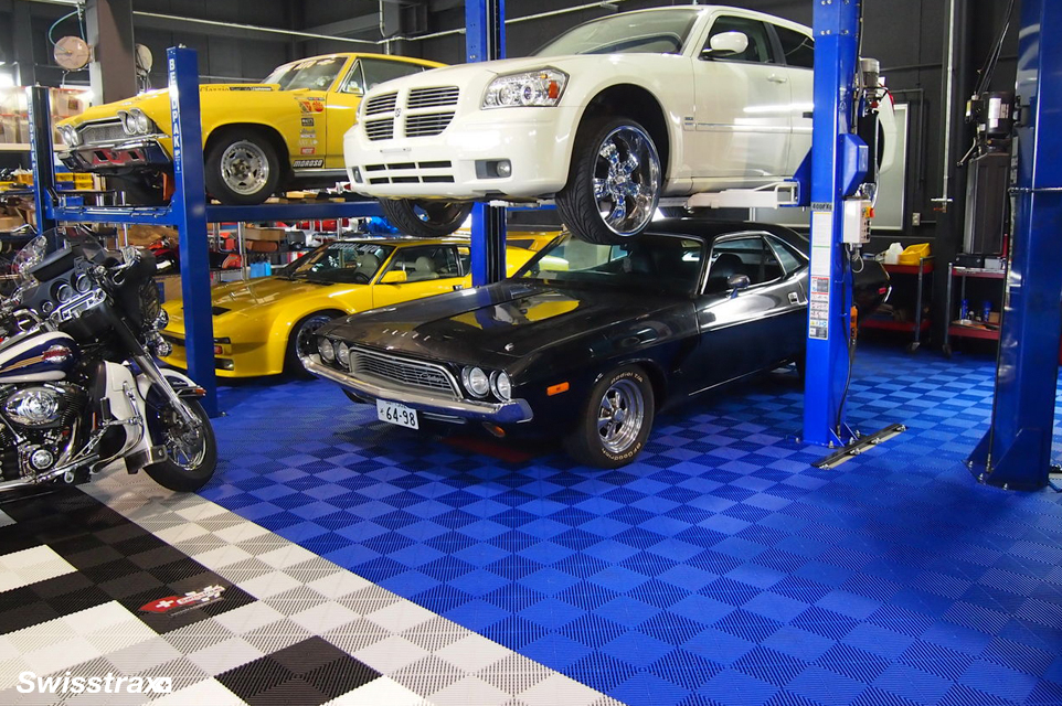 Ribtrax garage floor tiles used in a car workshop