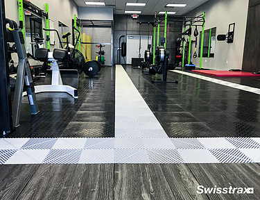 Diamondtrax, Vinyltrax, and Ribtrax floor tiles installed in a gym