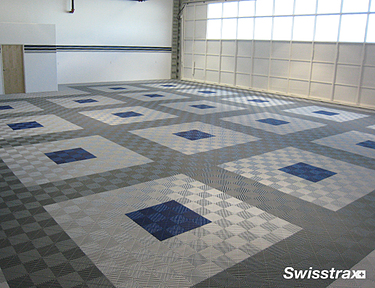 Large airplane hangar with custom designed flooring from Swisstrax
