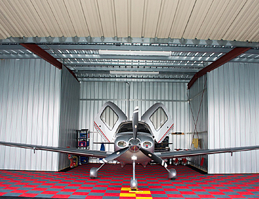 Swisstrax modular floor tiles inside of private hangar