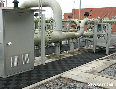 Swisstrax floor tiles used around water supply piping