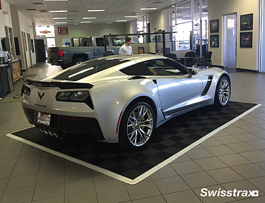Car dealership showroom installed with a garage floor mat from Swisstrax