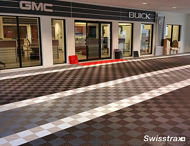 Swisstrax interlocking floor tiles installed in the dealership showroom