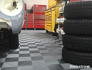 Garage tune shop with interlocking garage floor tiles from Swisstrax