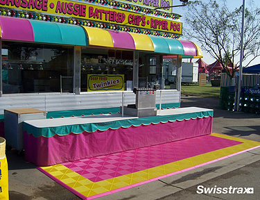 Food stand installed with bright and colorful interlocking floor tiles from Swisstrax