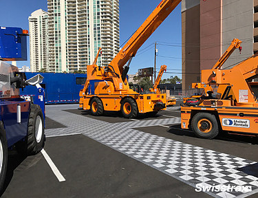 Outdoor trade show using black and white interlocking floor tiles from Swisstrax