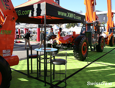 Trade show event using green interlocking floor tiles from Swisstrax