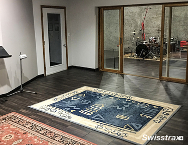 Basement studio with carpet over flooring from Swisstrax