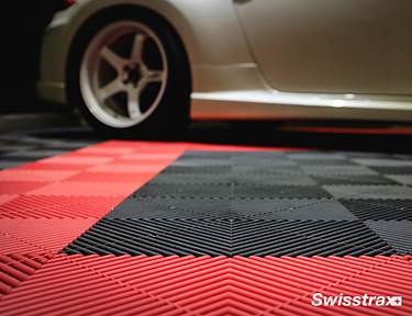 Red and black Swisstrax garage floor tiles