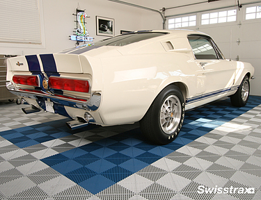 Blue and white Ribtrax Pro tiles installed in Shelby Cobra themed garage