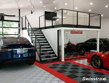Large garage with a living space installed with Swisstrax tiles