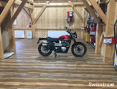 Motorcycle garage with Vinylrax floor tiles installed