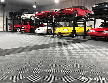 Large garage installed with Swisstrax garage floor tiles