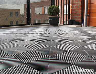 Closeup view of Ribtrax Pro tiles installed on a balcony