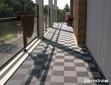Ribtrax Pro tiles installed on a large balcony overseeing the street
