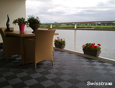 Small balcony using Swisstrax's modular floor tilesg