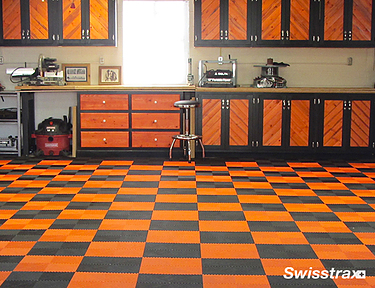 Wood workshop with Swisstrax flooring arranged in a checkboard pattern on the floor