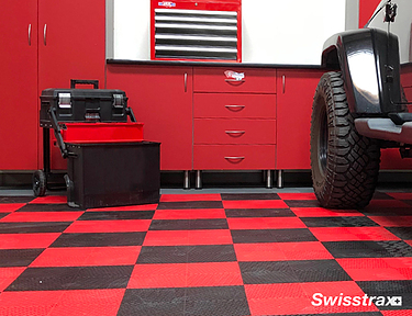 Garage workshop with red and black checkerboard floor tiles